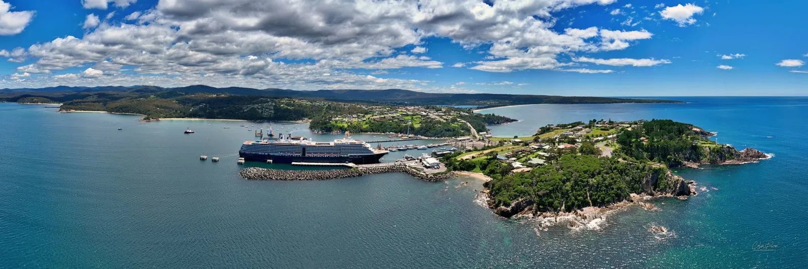 Panorama of the Port of Eden looking north, with the Westerdam in the foreground