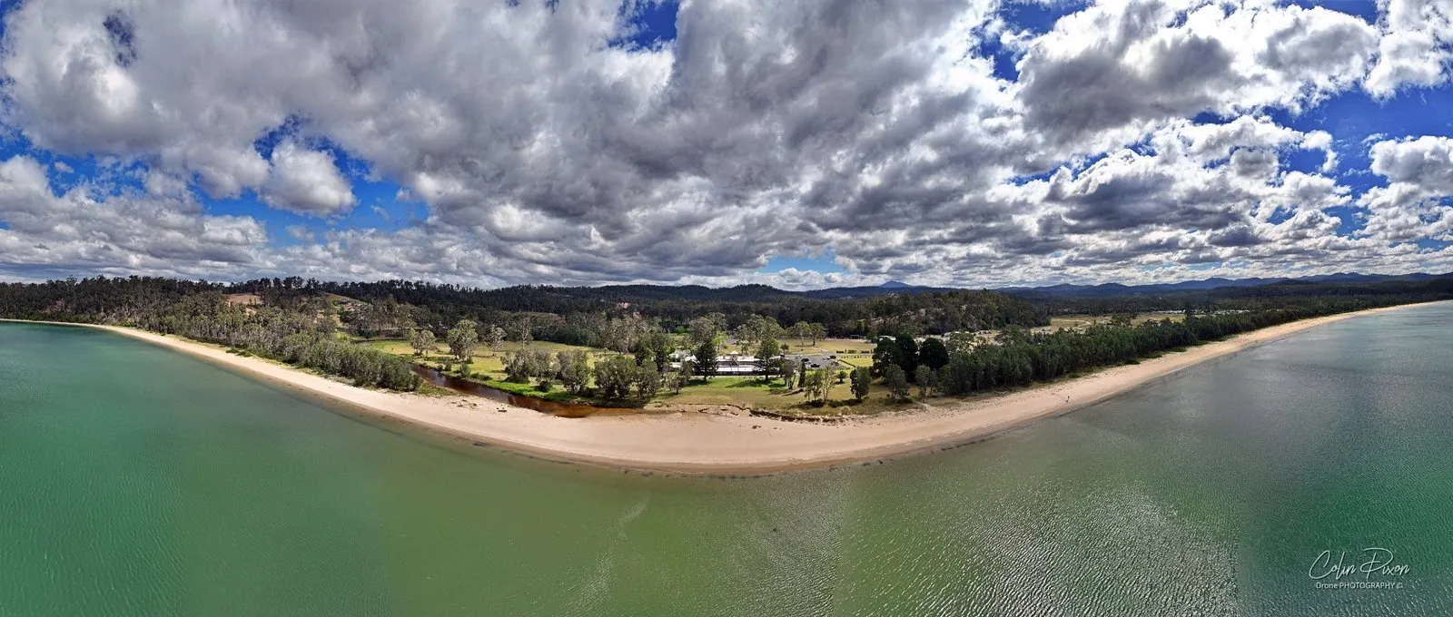 A 180 degree panorama over the water to the beach and the Seahorse Inn among the trees